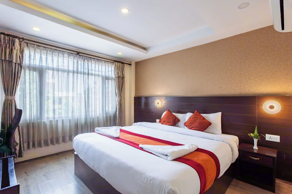 Premium bedding, desk, laptop workspace, free WiFi