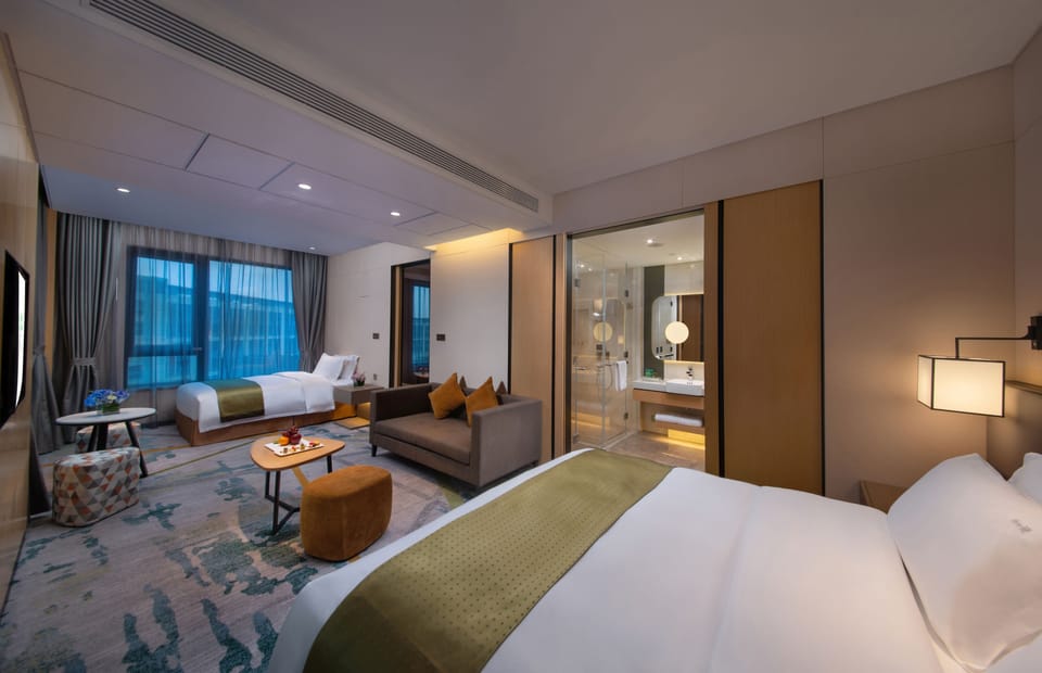 Suite, Multiple Beds | 1 bedroom, premium bedding, minibar, in-room safe