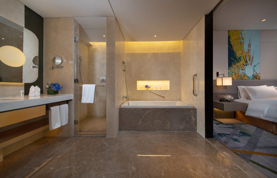 Hydromassage showerhead, free toiletries, hair dryer, bathrobes