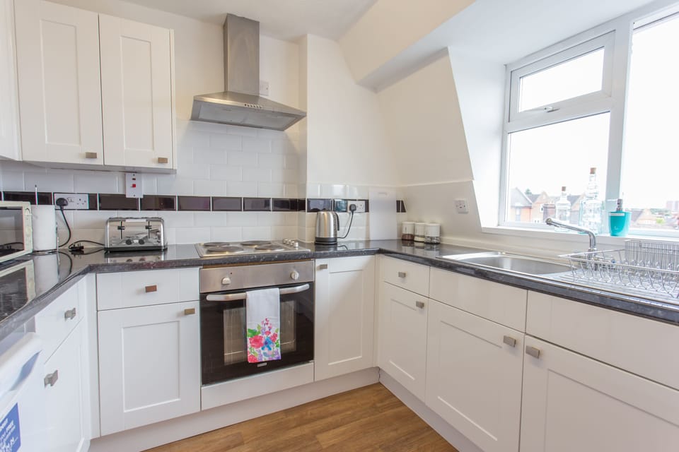 Apartment, 2 Bedrooms | Private kitchen | Full-size fridge, microwave, oven, stovetop