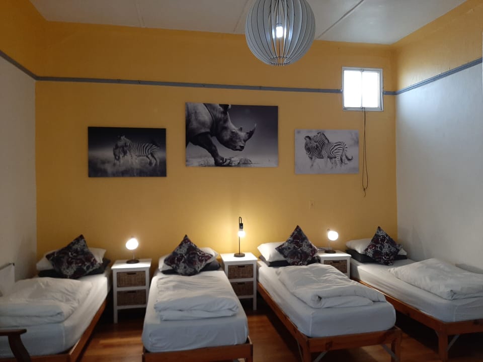Room (5 single beds) | Iron/ironing board, bed sheets