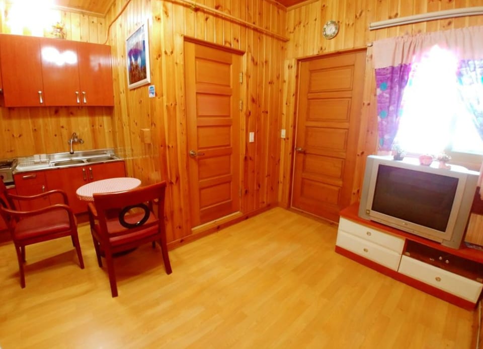 Duplex | Living area | 30-inch flat-screen TV with cable channels, TV