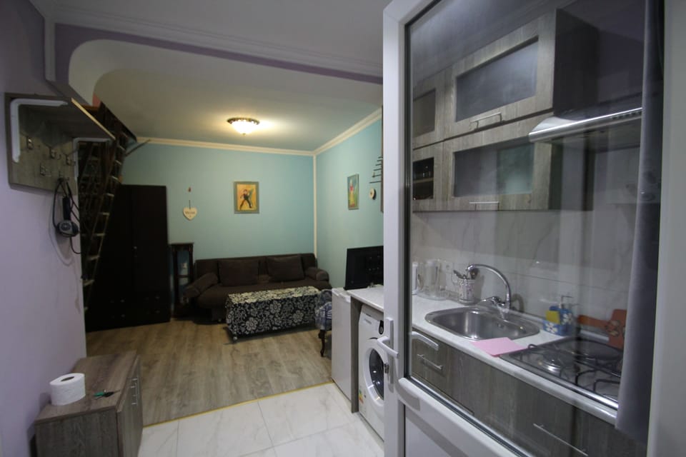 Deluxe Duplex, 1 Queen Bed with Sofa bed, Non Smoking | Living room