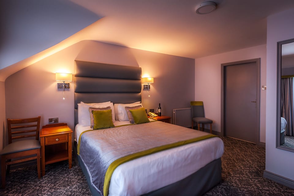 Double Room | Desk, blackout drapes, iron/ironing board, free WiFi