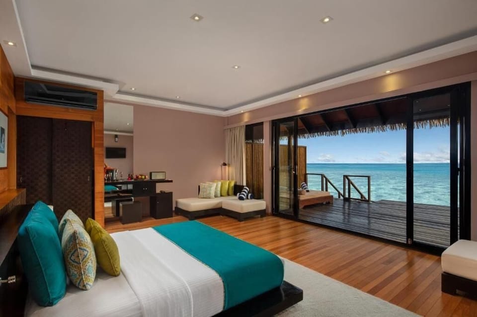 Villa, Jetted Tub, Overwater | Free minibar, in-room safe, desk, iron/ironing board