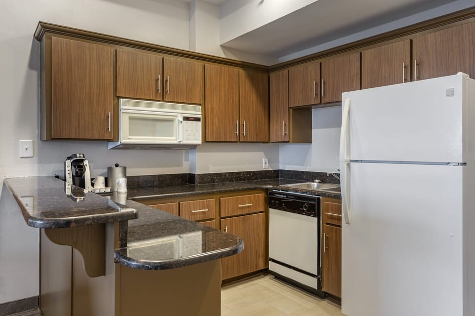Suite, 1 Bedroom | 1 bedroom, in-room safe, blackout drapes, iron/ironing board