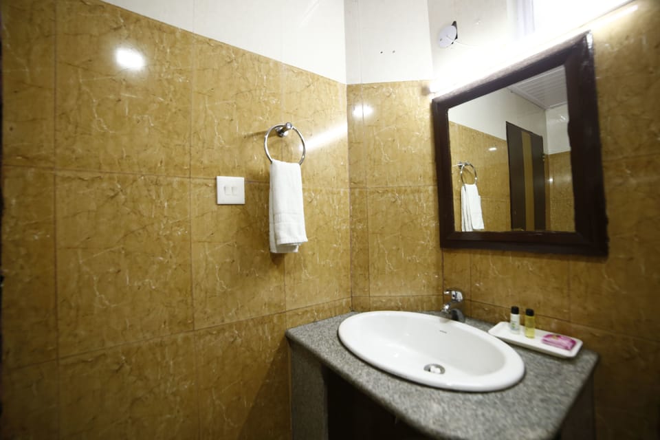 Premium Double or Twin Room, 1 Double Bed, Smoking, Hill View | Bathroom | Shower, slippers, towels