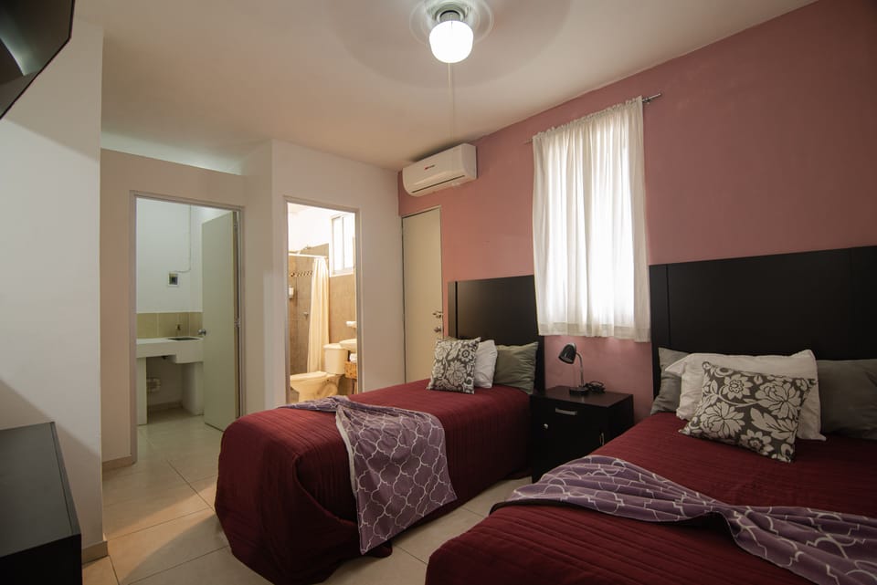 Standard Room, 2 Twin Beds, Non Smoking | Individually furnished, iron/ironing board, bed sheets