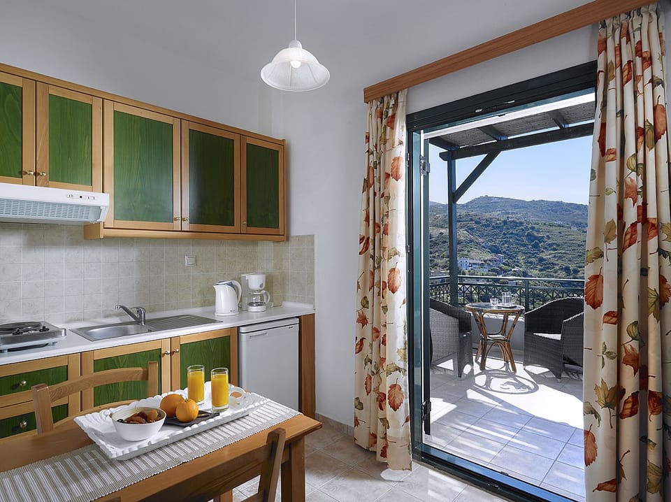 Apartment, 1 Bedroom, Sea View | Private kitchenette | Fridge, coffee/tea maker, electric kettle