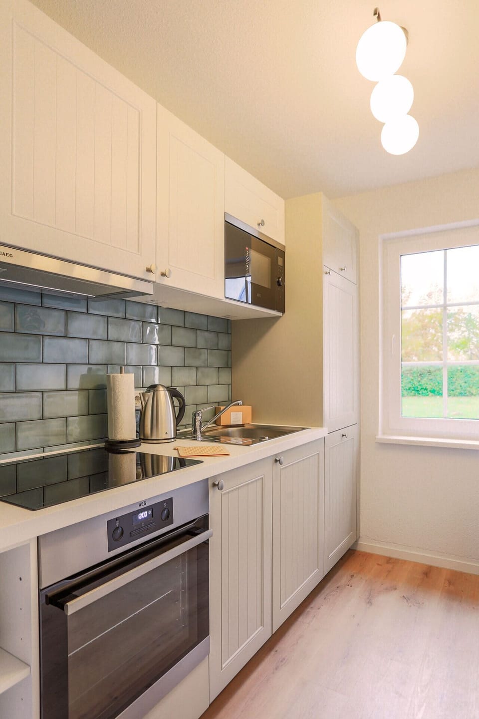 Apartment (Type 5) | Private kitchen | Full-size fridge, microwave, oven, stovetop