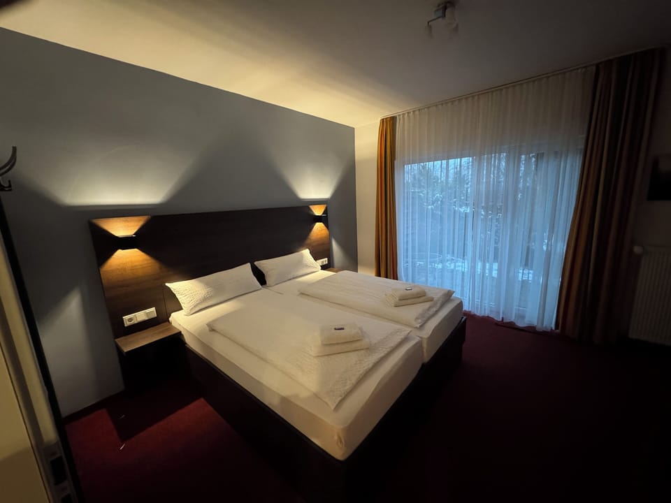 Double or Twin Room | Minibar, desk, blackout drapes, free WiFi
