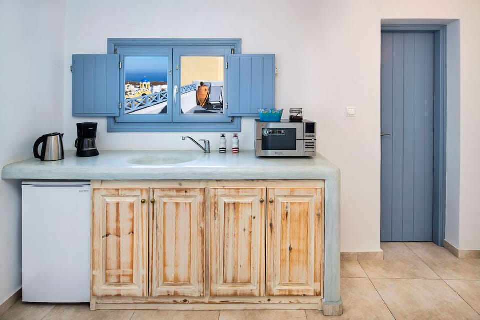 Apartment, 1 Bedroom, Hot Tub (Tsikoudia) | Private kitchenette | Full-size fridge, coffee/tea maker, electric kettle