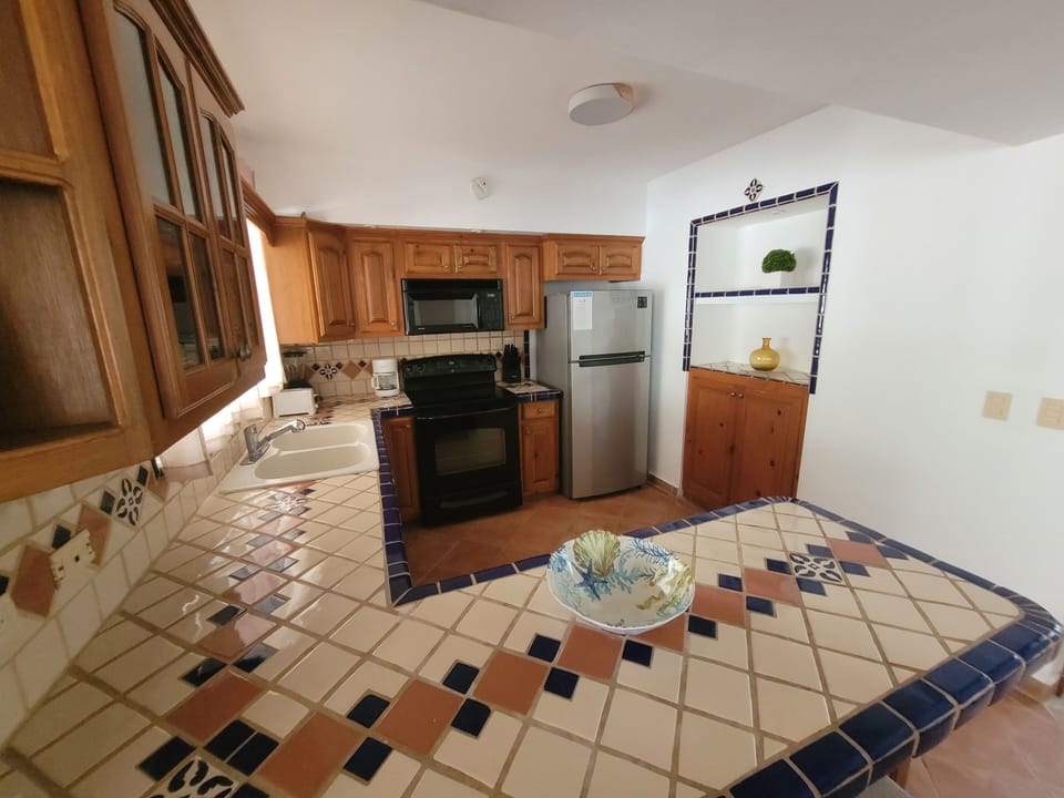 Family Villa, Multiple Beds, Non Smoking | Private kitchen | Full-size fridge, microwave, oven, stovetop