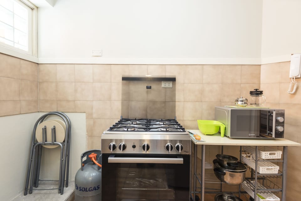 Business Apartment, Multiple Beds, Non Smoking | Shared kitchen | Coffee/tea maker, fridge, microwave, oven