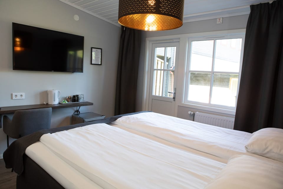 Family Quadruple Room, Multiple Beds, Non Smoking, Ground Floor | Desk, blackout drapes, WiFi (free), bed sheets
