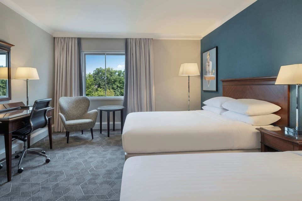 Family Room, 2 Queen Beds | Premium bedding, in-room safe, desk, blackout drapes