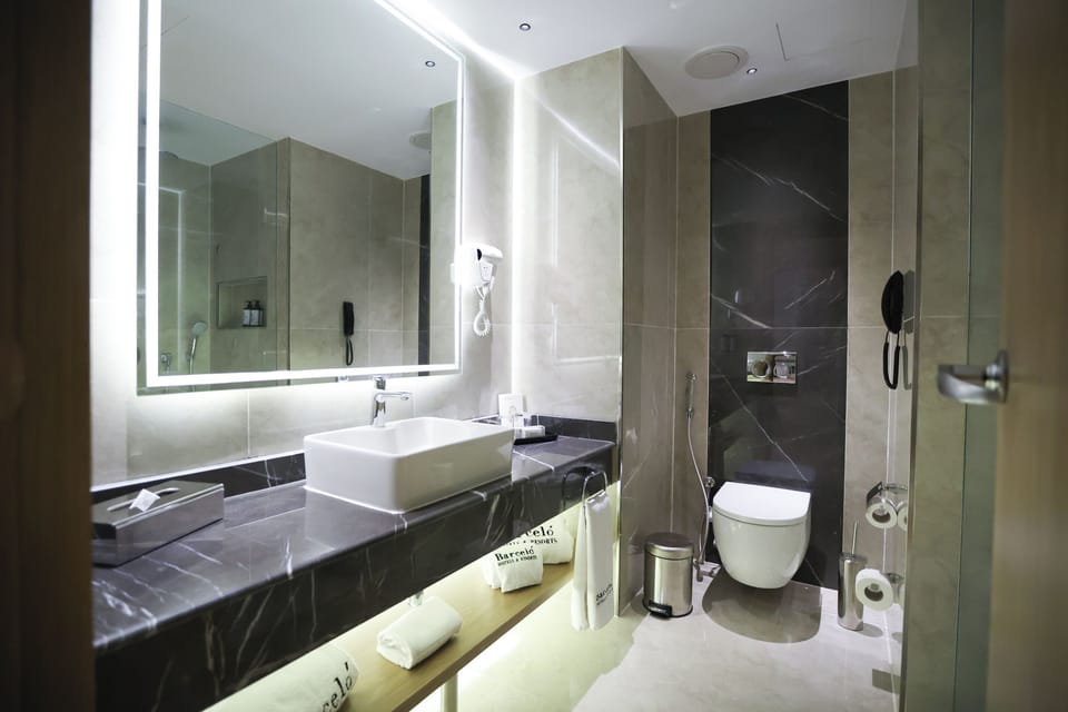 Shower, free toiletries, hair dryer, slippers
