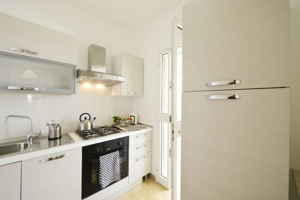 Villa, 2 Bedrooms | Private kitchen | Espresso maker, coffee/tea maker, full-size fridge, stovetop