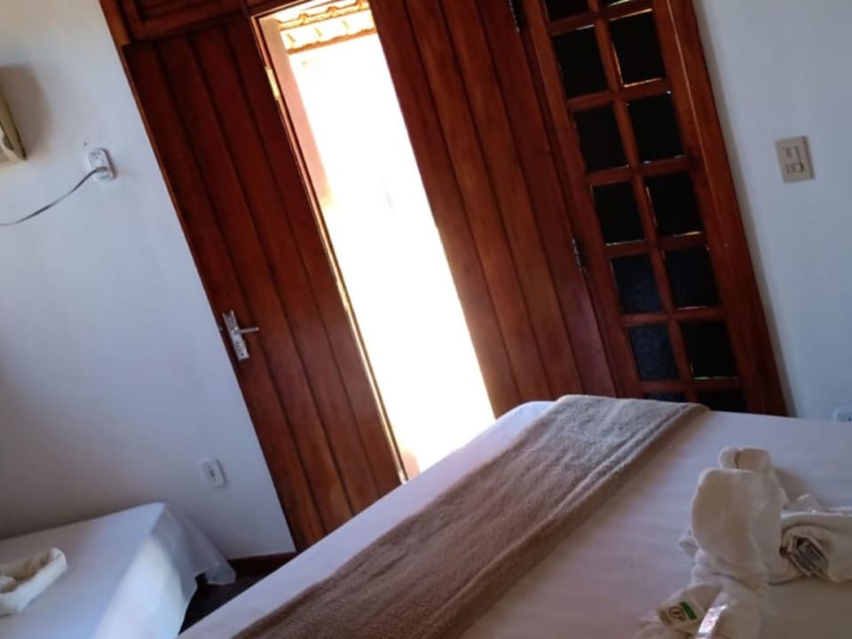Triple Room, Multiple Beds | Minibar, free WiFi, bed sheets