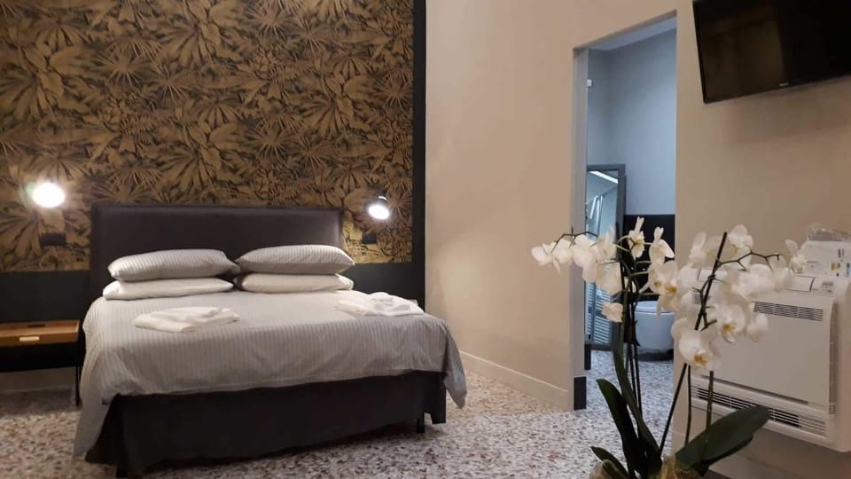 Down comforters, iron/ironing board, free WiFi, bed sheets