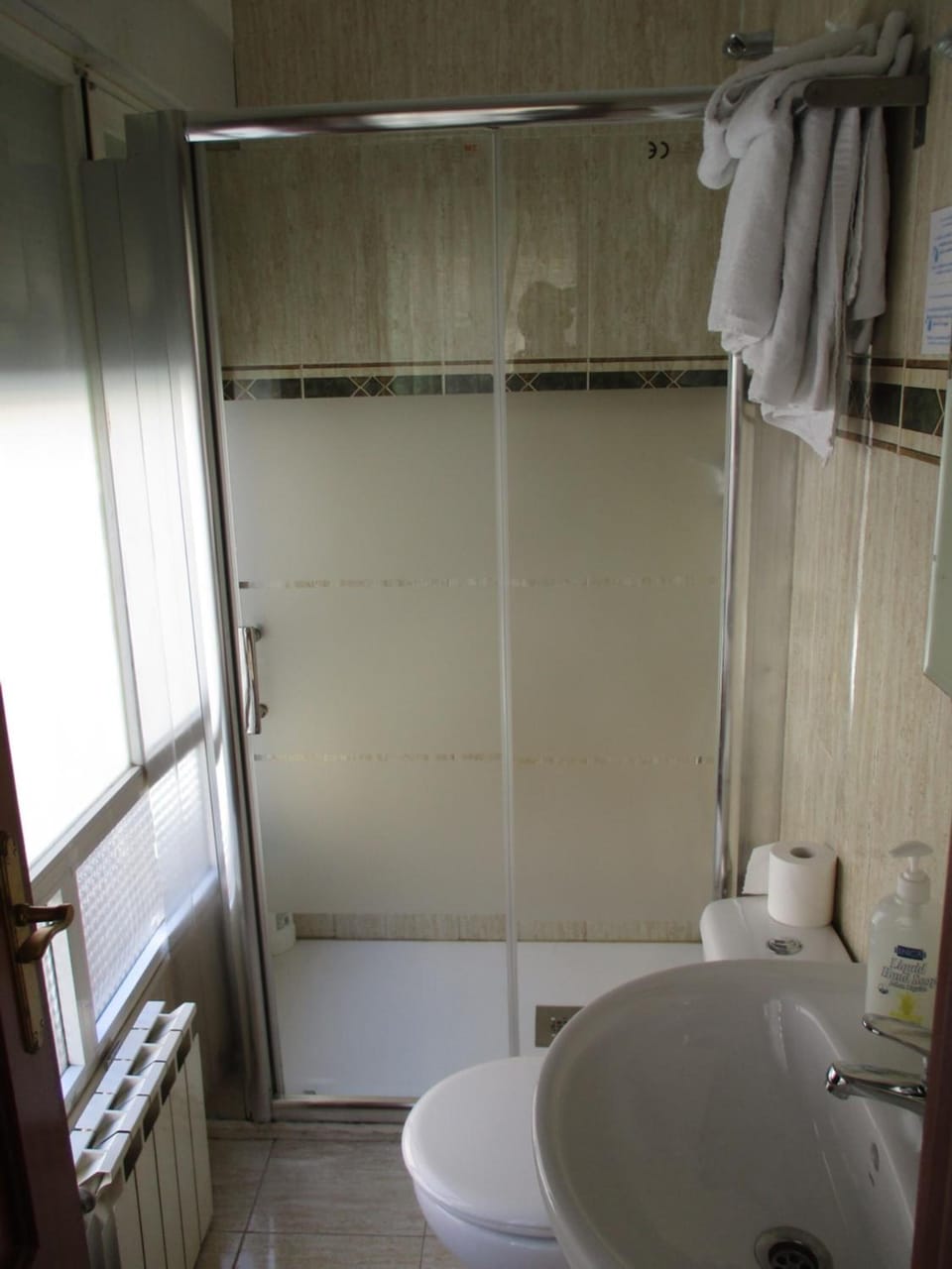 Shower, free toiletries, hair dryer, towels