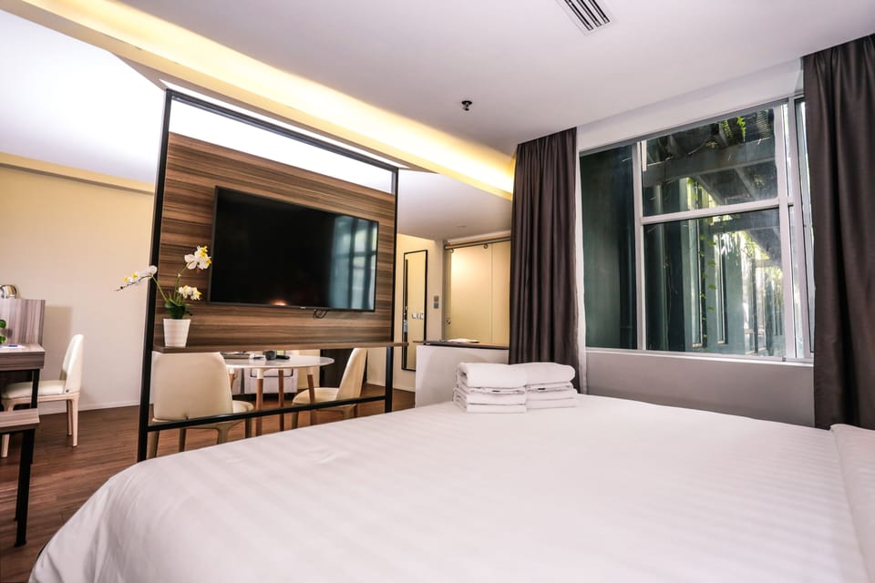 Premium bedding, down comforters, pillowtop beds, minibar