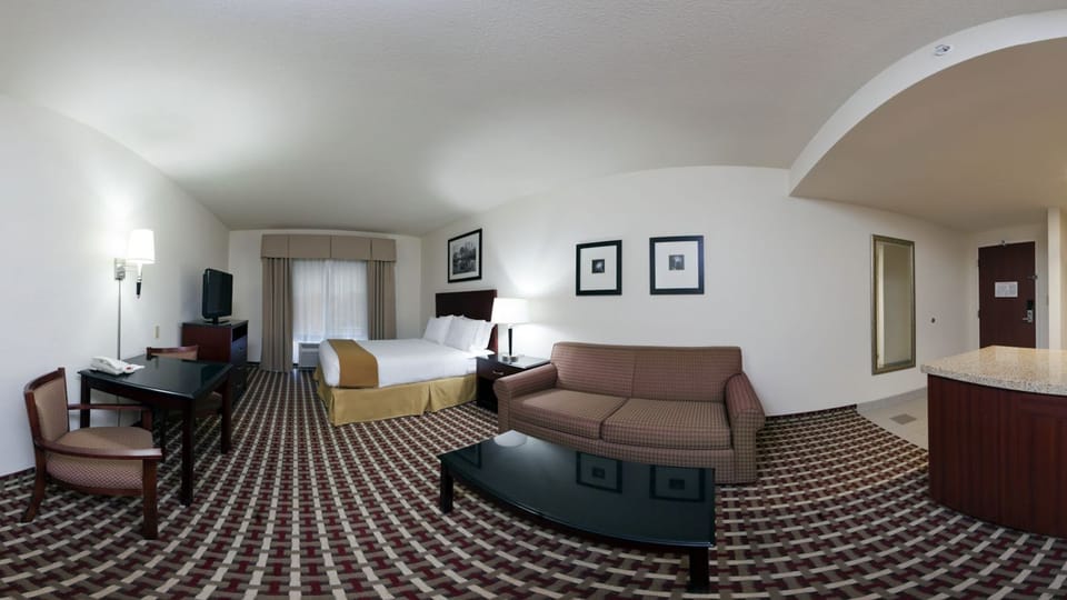 Standard Room, 1 King Bed with Sofa bed | Living area | 42-inch flat-screen TV with cable channels, TV, iPod dock