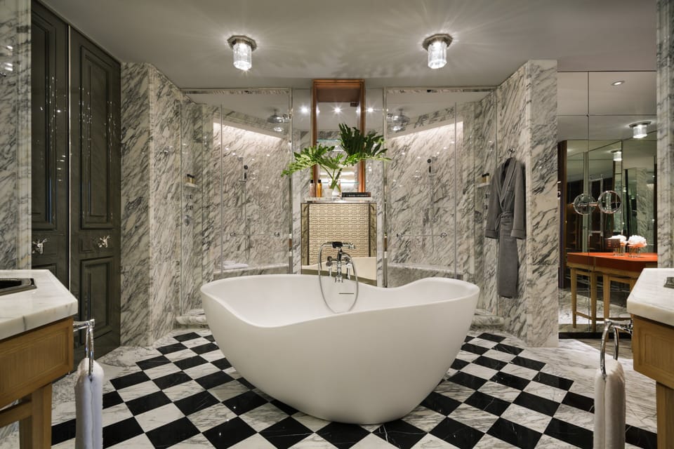 Separate tub and shower, free toiletries, hair dryer, bathrobes