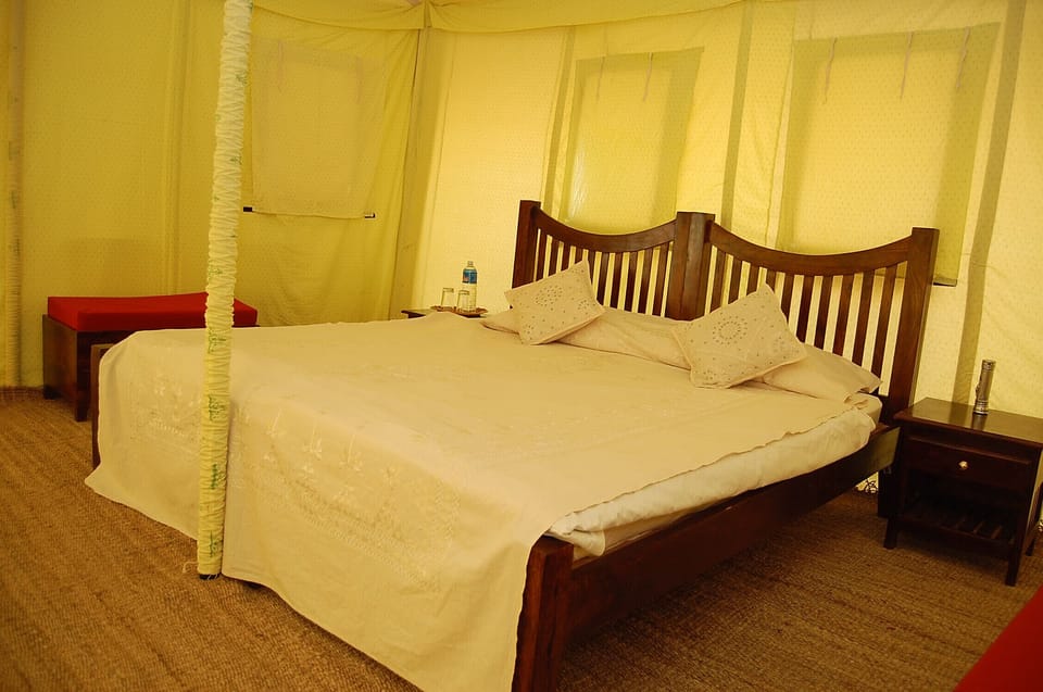 Desk, iron/ironing board, bed sheets