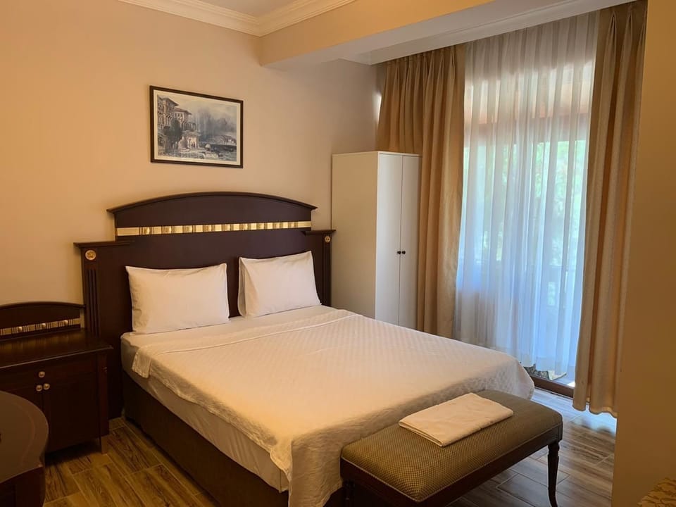 Standard Triple Room, 1 Bedroom | Minibar, in-room safe, free WiFi