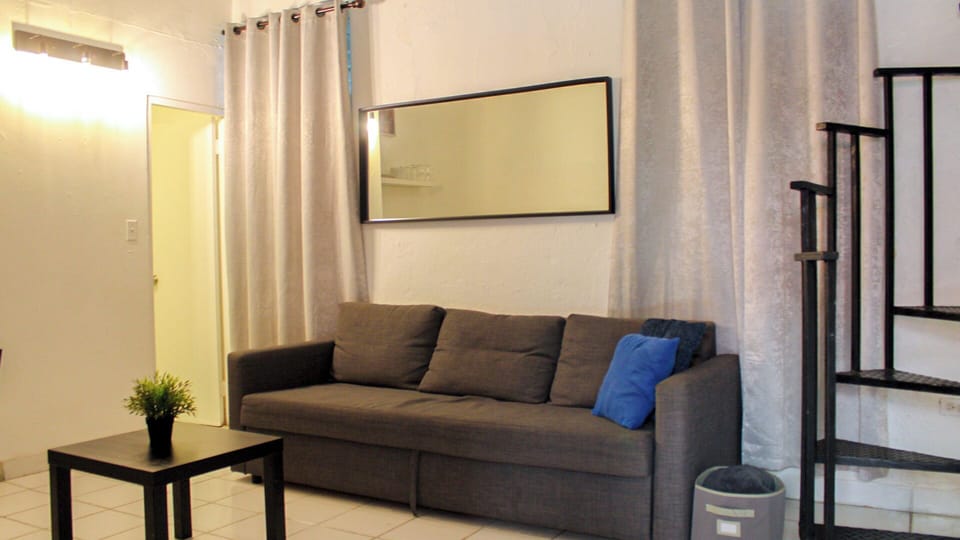 Apartment, 1 Bedroom | Living area | Flat-screen TV