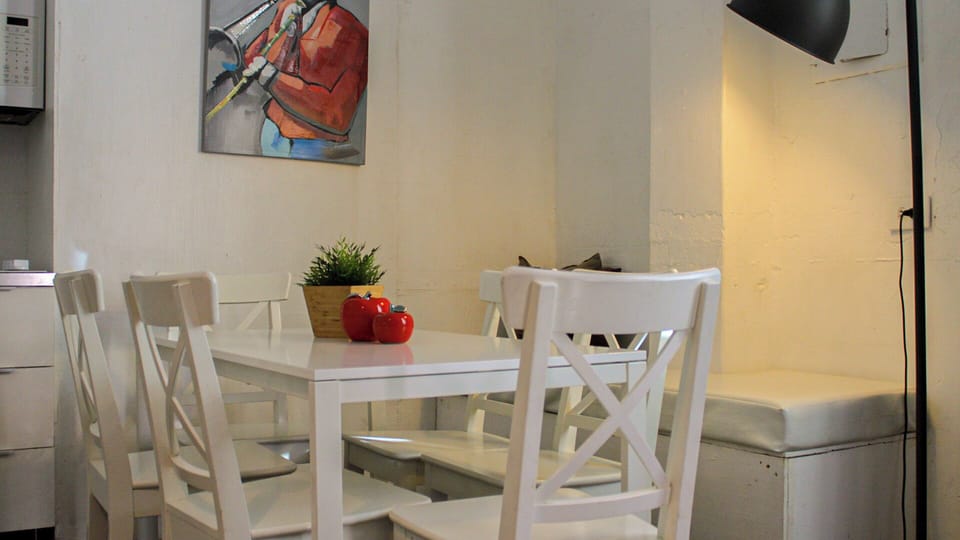 Apartment, 4 Bedrooms | Living area | Flat-screen TV