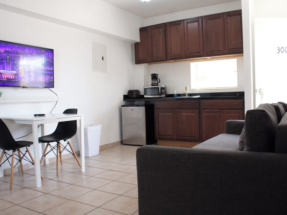 Apartment, 1 Bedroom | Living area | Flat-screen TV