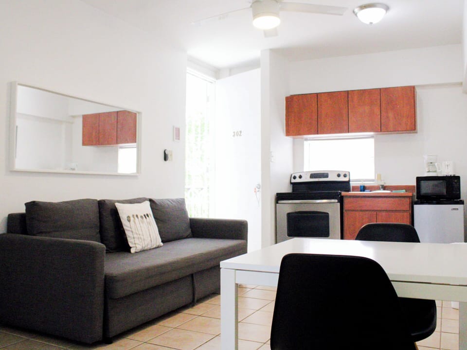 Apartment, 1 Bedroom | Living area | Flat-screen TV