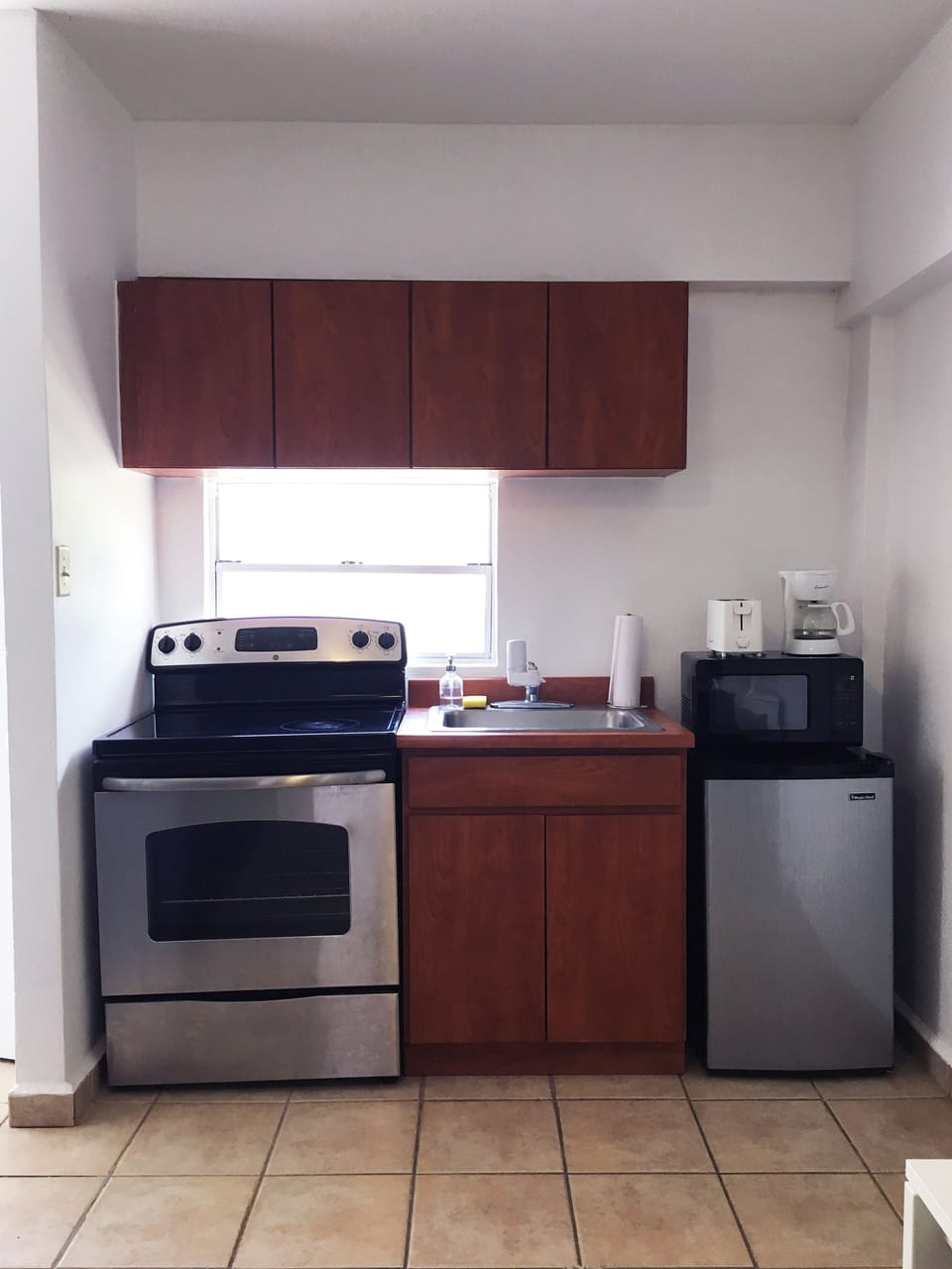 Apartment, 1 Bedroom | Private kitchen | Fridge, microwave, stovetop, coffee/tea maker