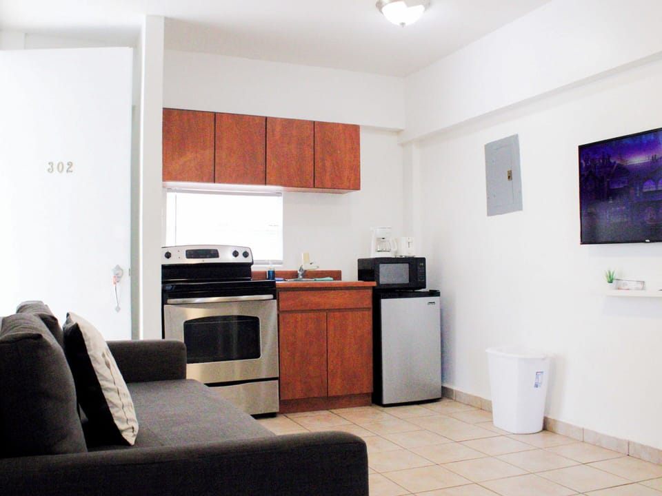 Apartment, 1 Bedroom | Living area | Flat-screen TV