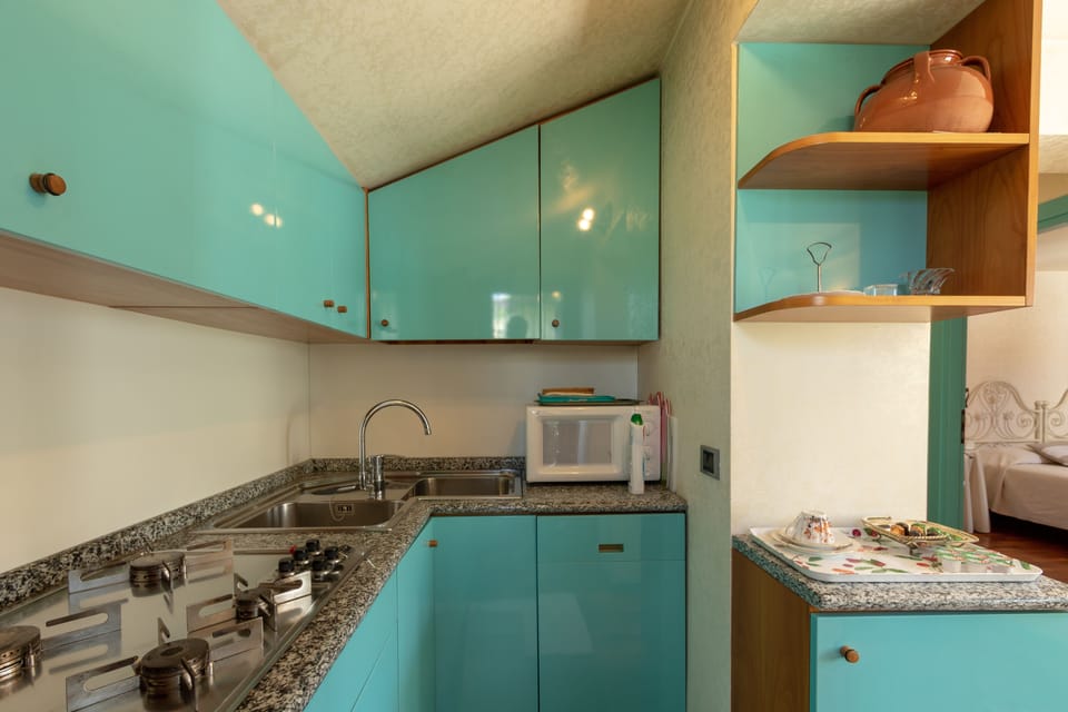 Classic Apartment, 1 Bedroom | Private kitchen | Full-size fridge, microwave, stovetop, dishwasher