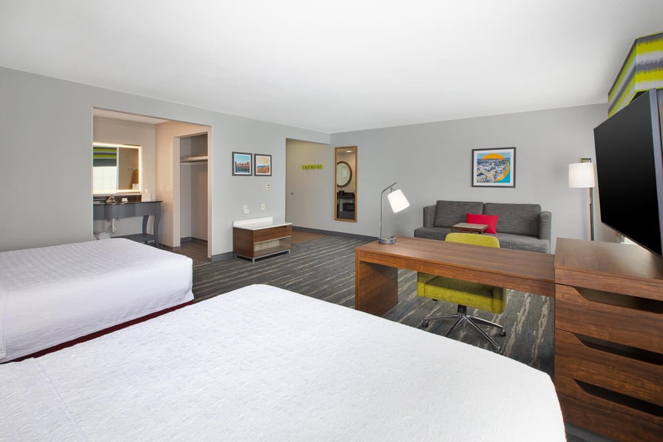 Studio Suite, 2 Queen Beds | Desk, laptop workspace, iron/ironing board, free cribs/infant beds
