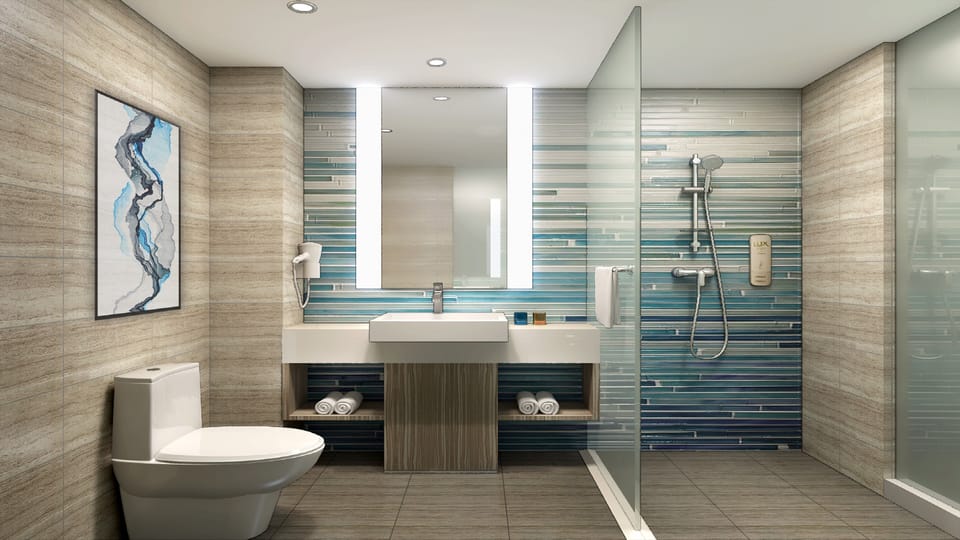 Shower, rainfall showerhead, free toiletries, hair dryer