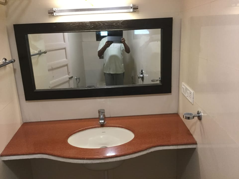A/c Super Deluxe Room | Bathroom amenities | Slippers, towels