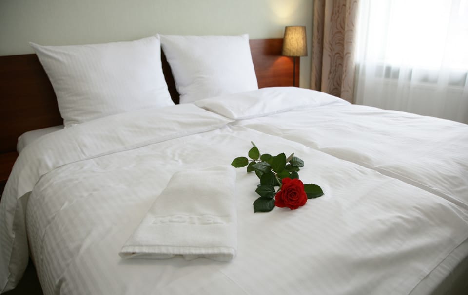 Triple Room | Select Comfort beds, in-room safe, desk, iron/ironing board