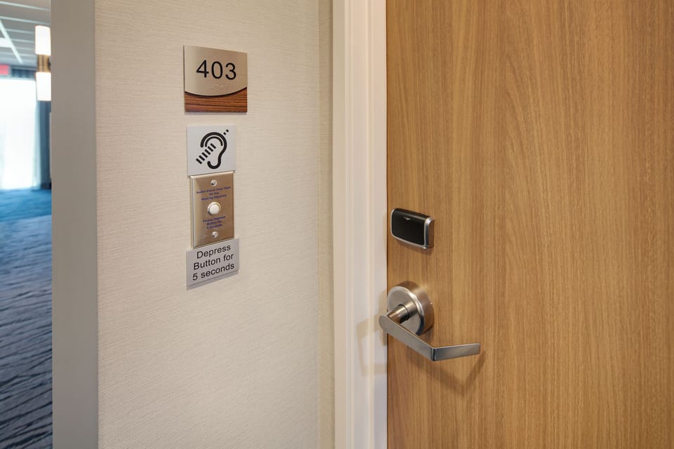 Suite, 1 King Bed with Sofa bed (Hearing Accessible) | Desk, iron/ironing board, free cribs/infant beds, free rollaway beds