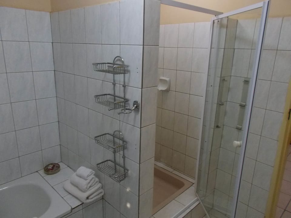 Standard Double Room, 1 Double Bed, Non Smoking | Bathroom | Separate tub and shower, rainfall showerhead, free toiletries, towels