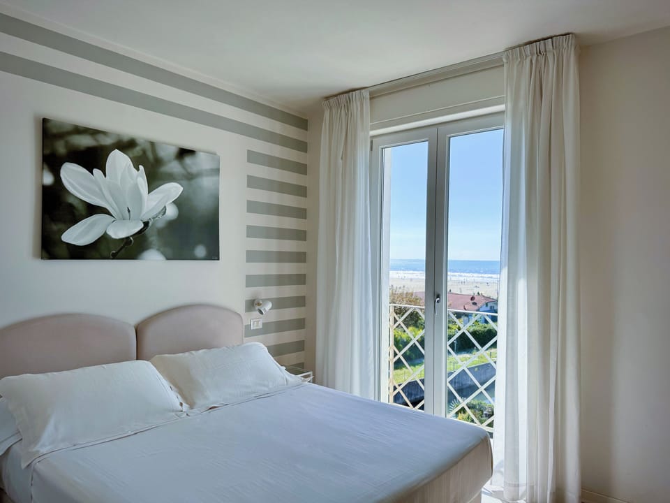 Family Quadruple Room, Sea View | In-room safe, desk, soundproofing, free WiFi