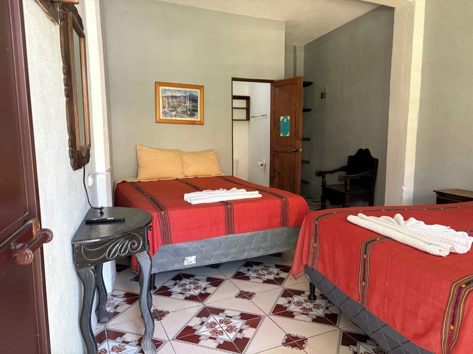 Desk, rollaway beds (free), WiFi (free), bed sheets