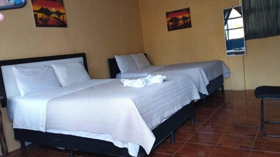 Classic Quadruple Room, Multiple Beds, Non Smoking | Desk, rollaway beds (free), WiFi (free), bed sheets
