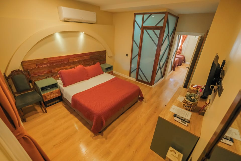 Family Room | Egyptian cotton sheets, premium bedding, down comforters, in-room safe
