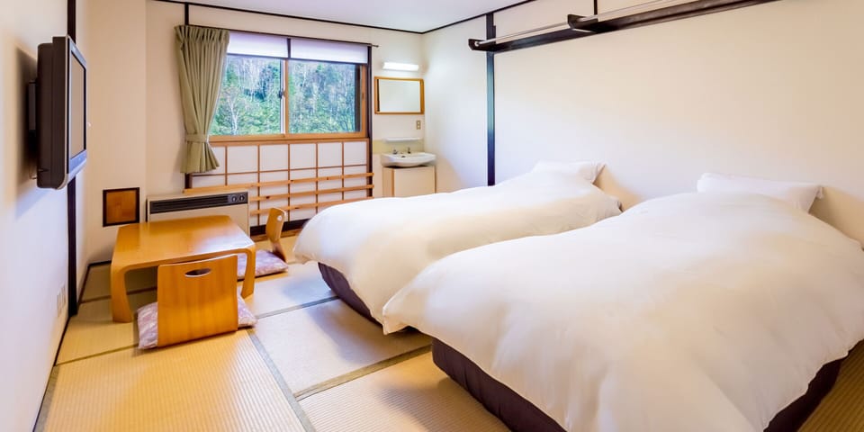 Twin Room without toilet (Shared Bathroom), Non Smoking | Free WiFi, bed sheets