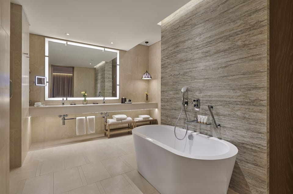 Separate tub and shower, deep soaking tub, rainfall showerhead
