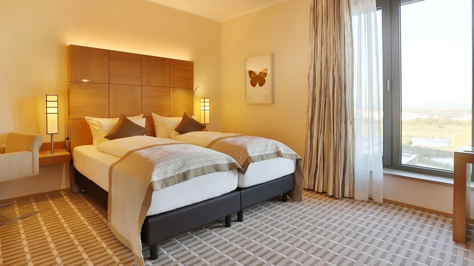 Hypo-allergenic bedding, in-room safe, desk, laptop workspace